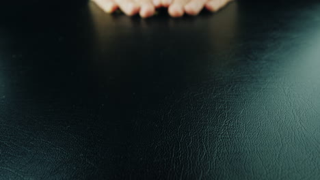 Hands-To-Take-A-Bunch-Of-Coins-From-The-Table