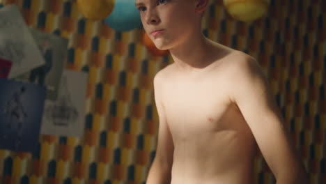 teenage boy in a room