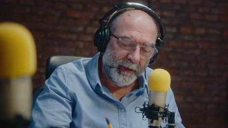 man recording podcast