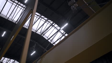 industrial facility interior with crane and overhead structure