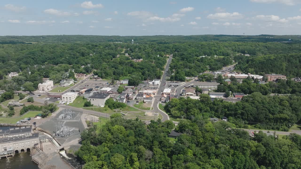 Downtown Scenery Of St. Croix Falls By The St. Croix River In Wisconsin, USA. Aerial Drone Shot