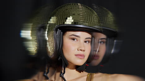 woman poses with mirrorball bunny ears