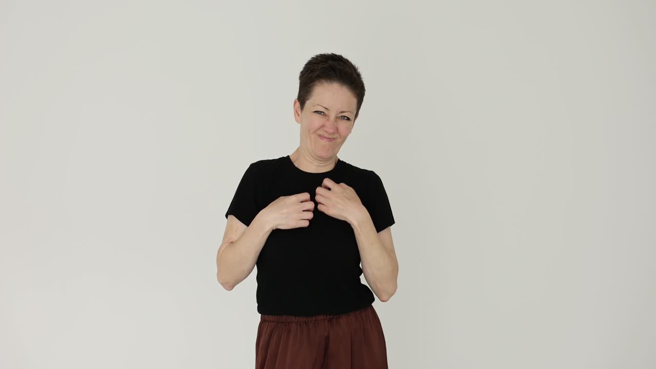 Woman scratching her arm due to skin irritation or discomfort