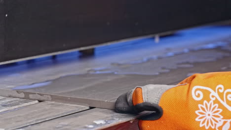 cutting tiles on a tile cutter