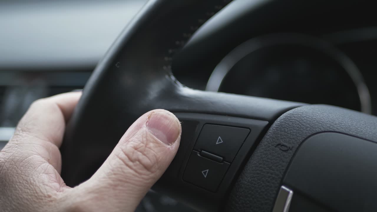 Finger Controls Buttons On Car Steering Wheel