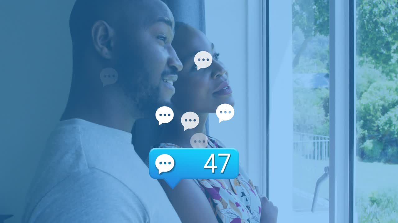 Mand og kvinde står i en dørkarm og ser antallet af tech-chats stige, mens de peger på og sporer den voksende interesse.