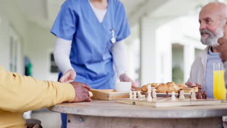 Woman,-nurse-and-hands-with-breakfast-in-elderly