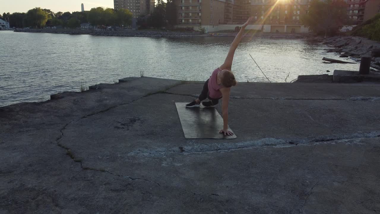 aerial women doing  outdoor fitness during summer