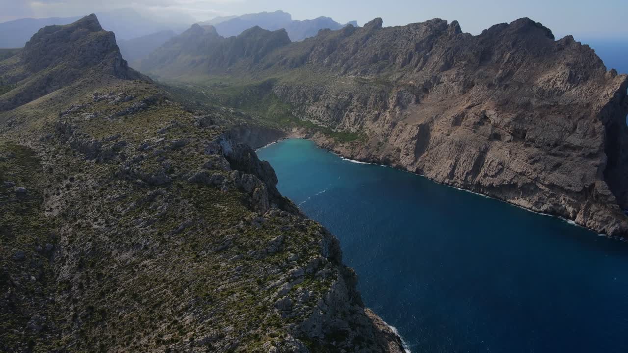 Discover breathtaking coastal vistas at Mirador es Colomer in Pollensa, Mallorca. Experience the rugged cliffs and azure waters of Cap Formentor and Tramuntana mountains.