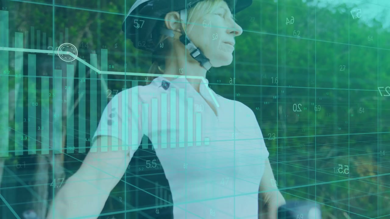 Wearable sensors sending data, cyclist gripping bars while charts over body highlighting fitness