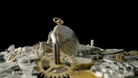 antique pocket watch and clockwork parts