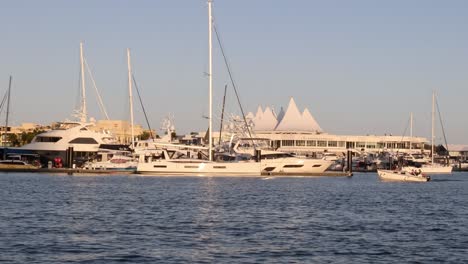 time-lapse of boats at a marina during sunset