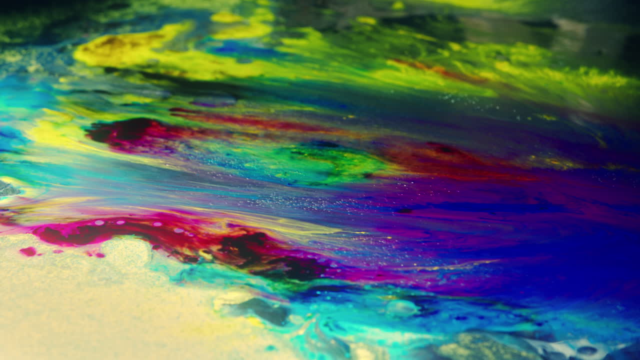 Colourful, organic, liquids macro shots buzzing and flowing