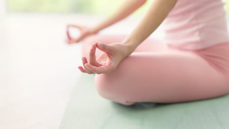 yoga, lotus meditation and hands of woman in home