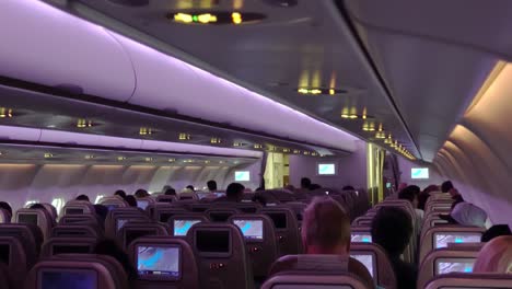 airplane cabin with in flight entertainment