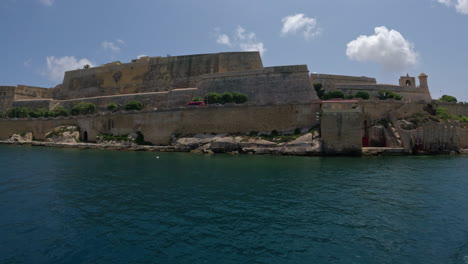 historic walls and buildings on a beautiful turquoise coast