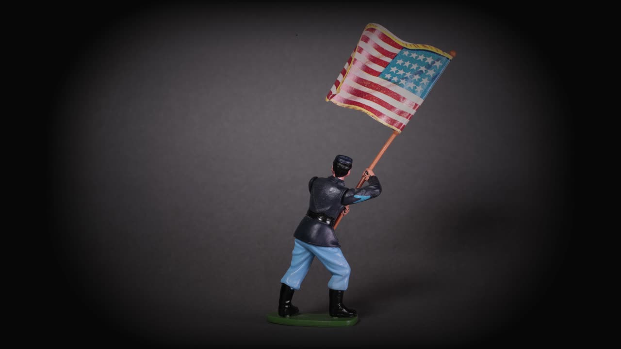 American Civil War flag bearer - stop motion of Union toy soldier with US flag
