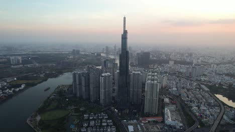 aerial spotlight of ho chi minh city modern skyline view at sunset