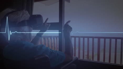 animación del monitor de ritmo cardíaco sobre el hombre de negocios usando auriculares vr