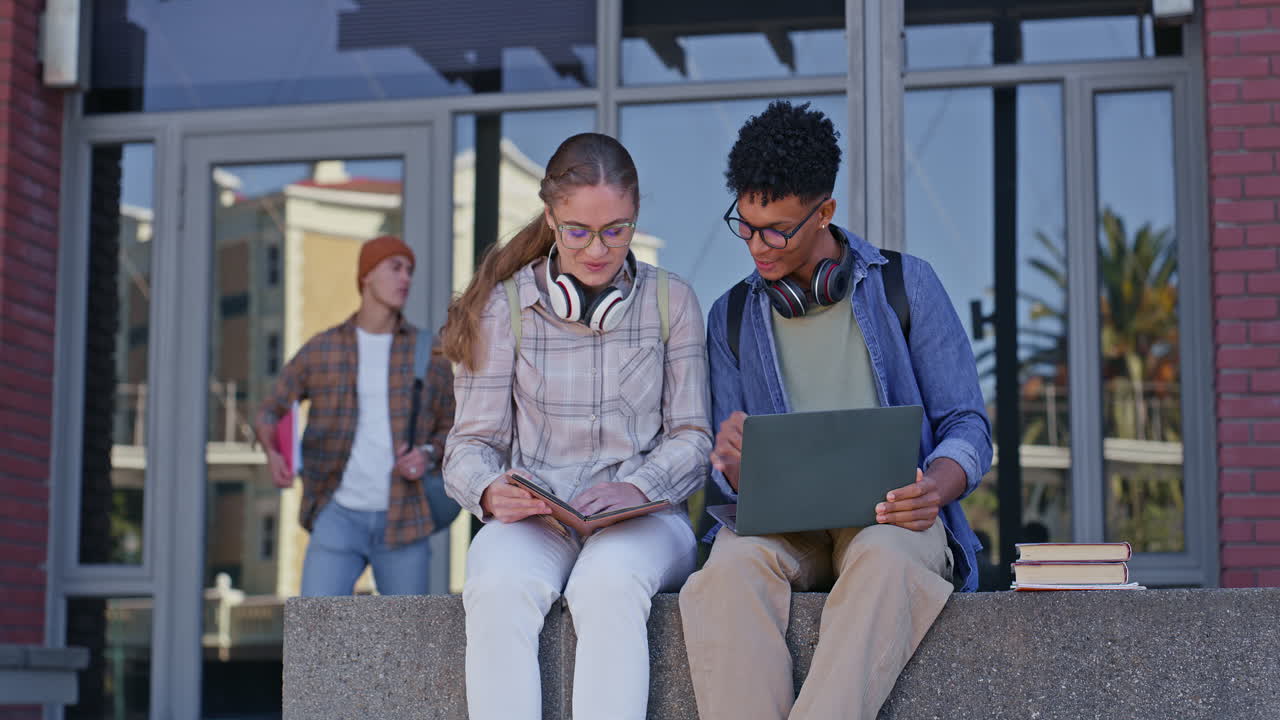 Students studying together on campus