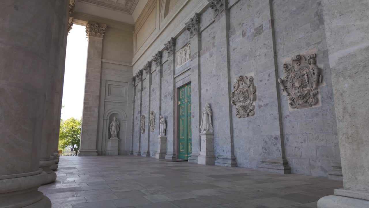 Close up of Esztergom Basilica entrance showing neoclassical columns and ornate statues