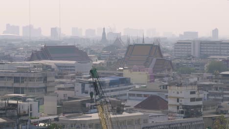 panorama over bangkok skyline with smog pollution