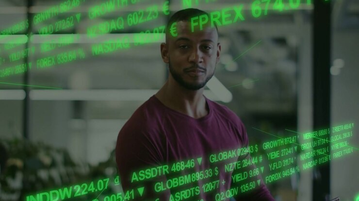 Responding to ticker updating, man in maroon tee scrolling smartphone in office with green overlay