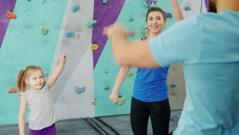 family celebrating rock climbing success