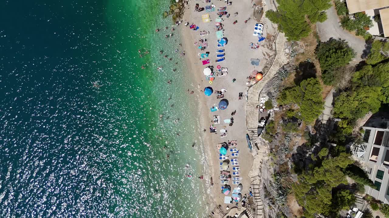 Drone aerial view of makarska harbour town city croatia balkan country balkans Biokovo mountains beach