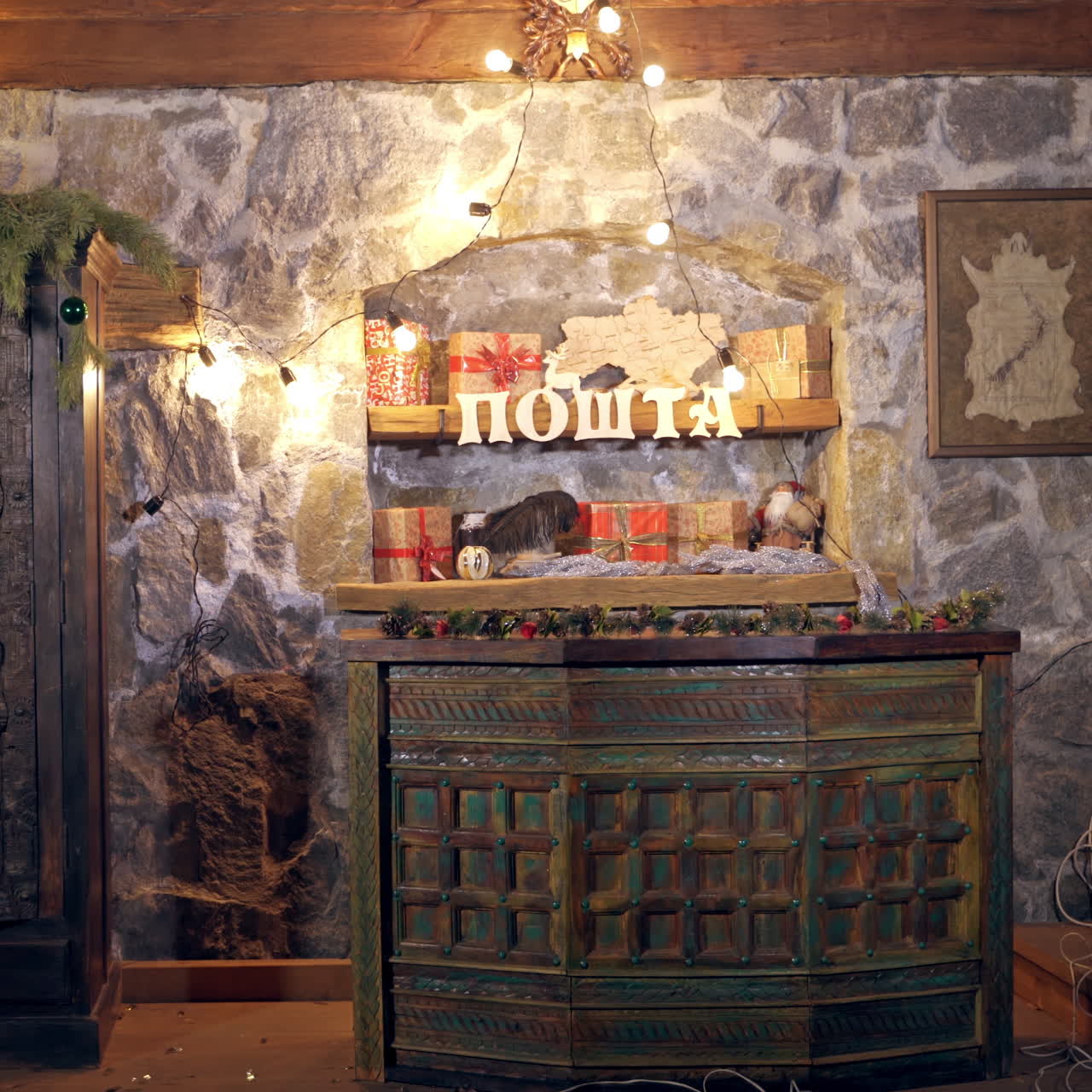 Elves inside the post office. Happy elves putting envelopes on the table in Christmas decorated room. New Year eve.