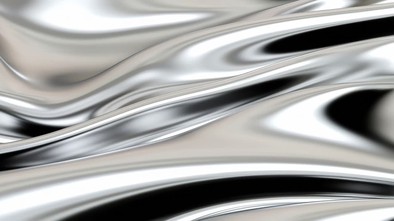 Abstract close-up video of smooth, flowing silver waves. Captured from a low angle
