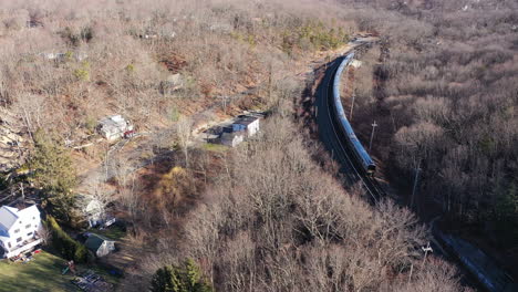 And-aerial-view-over-a-train-leaving-the-station-on-a-sunny-day