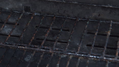 close up of dirty top roster of barbecue