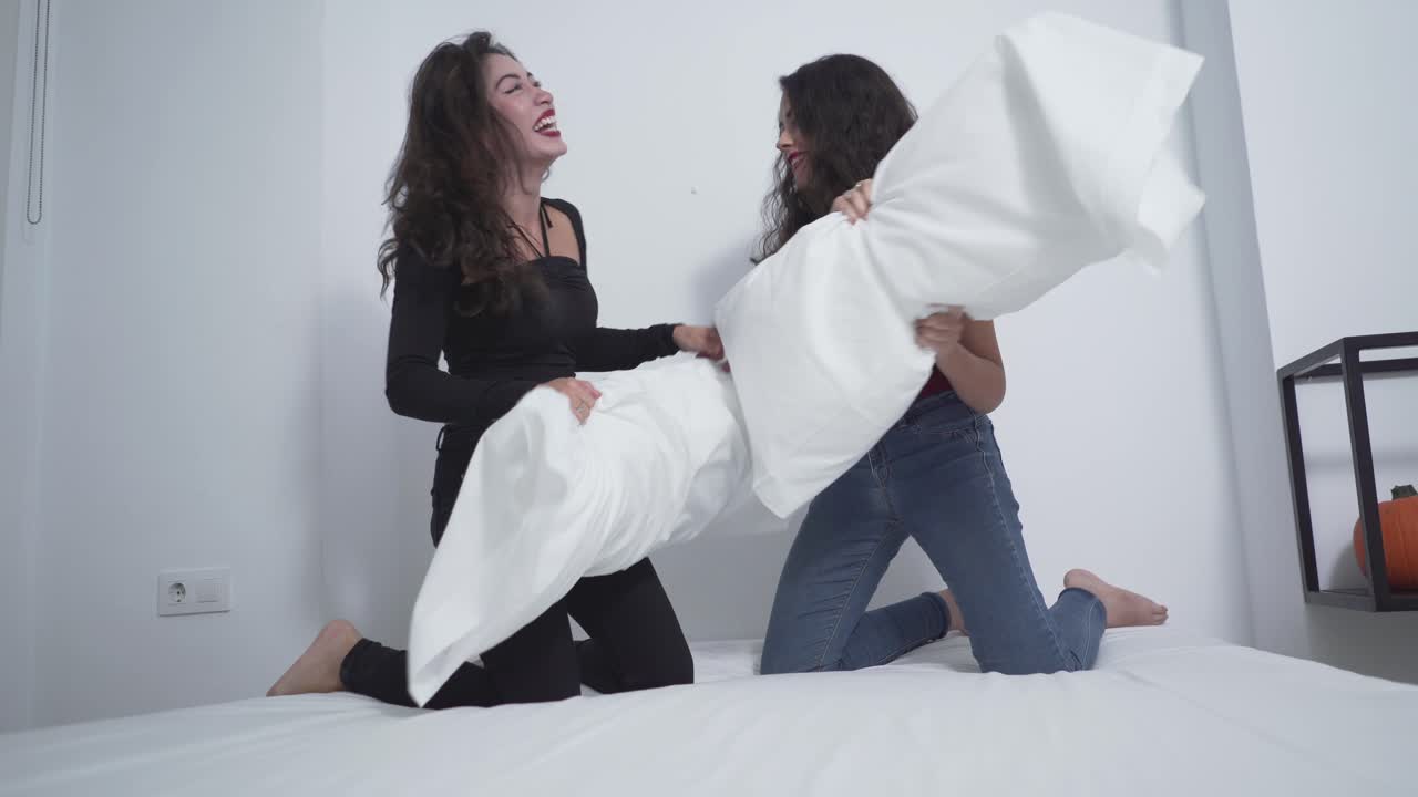 Two Girls Having a Pillow Fight