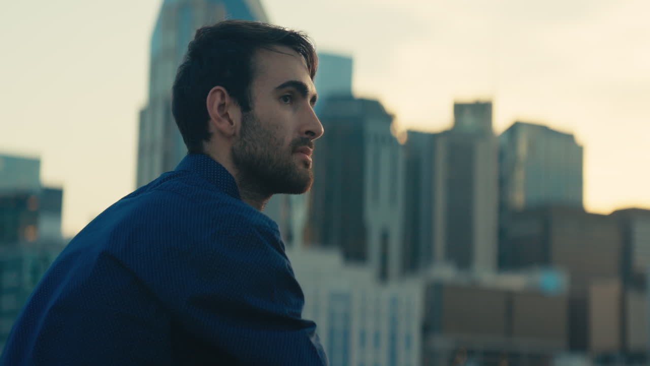 Man overlooking city skyline