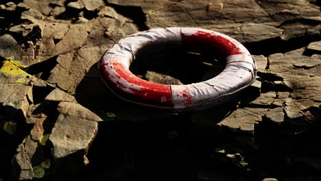 very old abandoned grungy lifebuoy