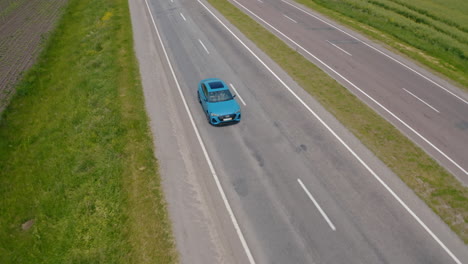 Speeding Audi e tron on the highway. New Audi e tron fully electric vehicle ob highway