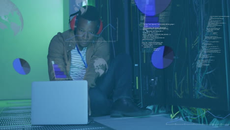 animation of data processing over african american it man by computer servers