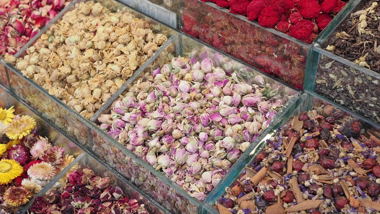 Assortment of Dried Flowers, Herbs, and Spices in a Market Stall