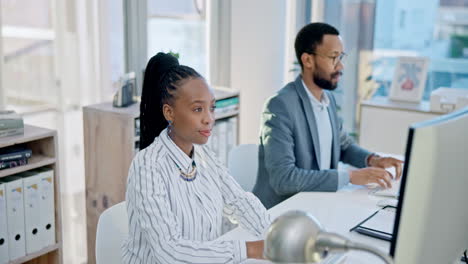 Business-people-typing-on-computer-in-coworking