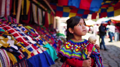 young girl in a colorful market