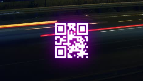 QR code scanner against light trails on black background