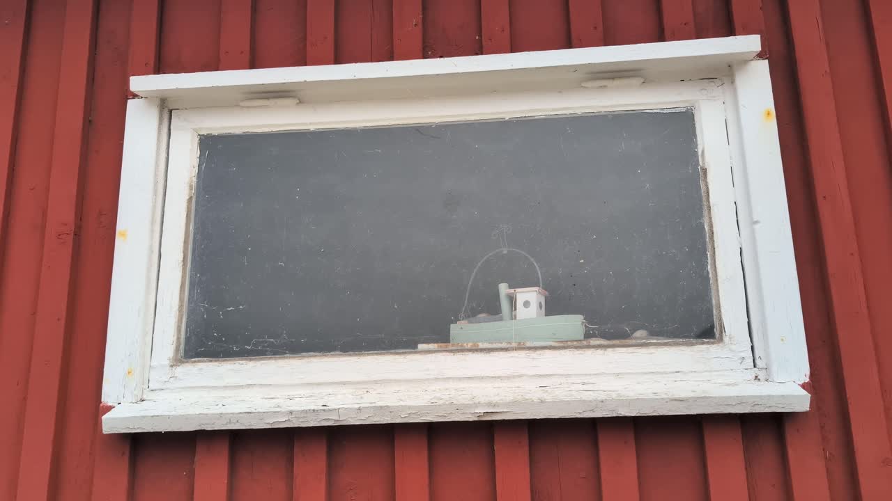 Window of a boathouse in Bovallstrand Sweden