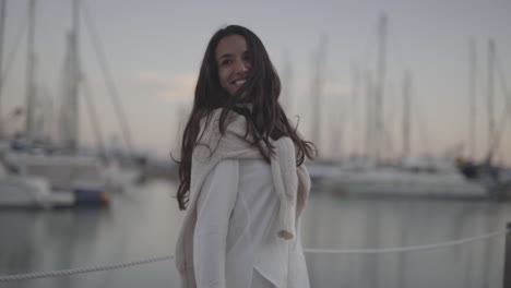 happy lovely day at barcelona harbour spanish model posing for winterwear