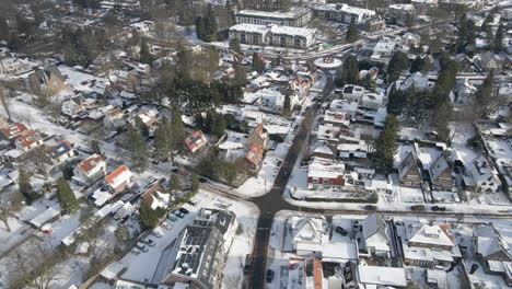 aerial of busy rural town in winter
