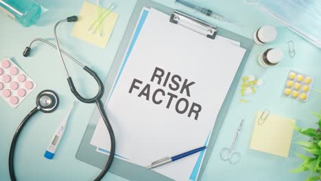 RISK FACTOR WRITTEN ON MEDICAL PAPER