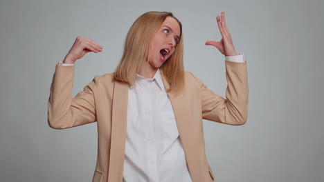 business woman showing bla-bla-bla nonsense gesture with hands, gossips empty promises, blah concept