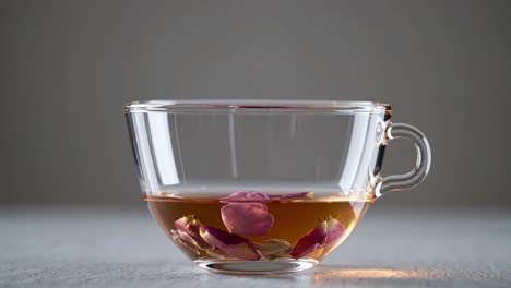 rose petal tea in a glass cup