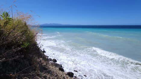 Ionian-Coastline,-Panoramic-Mediterranean-Beauty-with-Clean-Air,-Azure-and-White-Hues,-Wild-Herbariums,-and-an-Unspoiled-Rocky-Beach