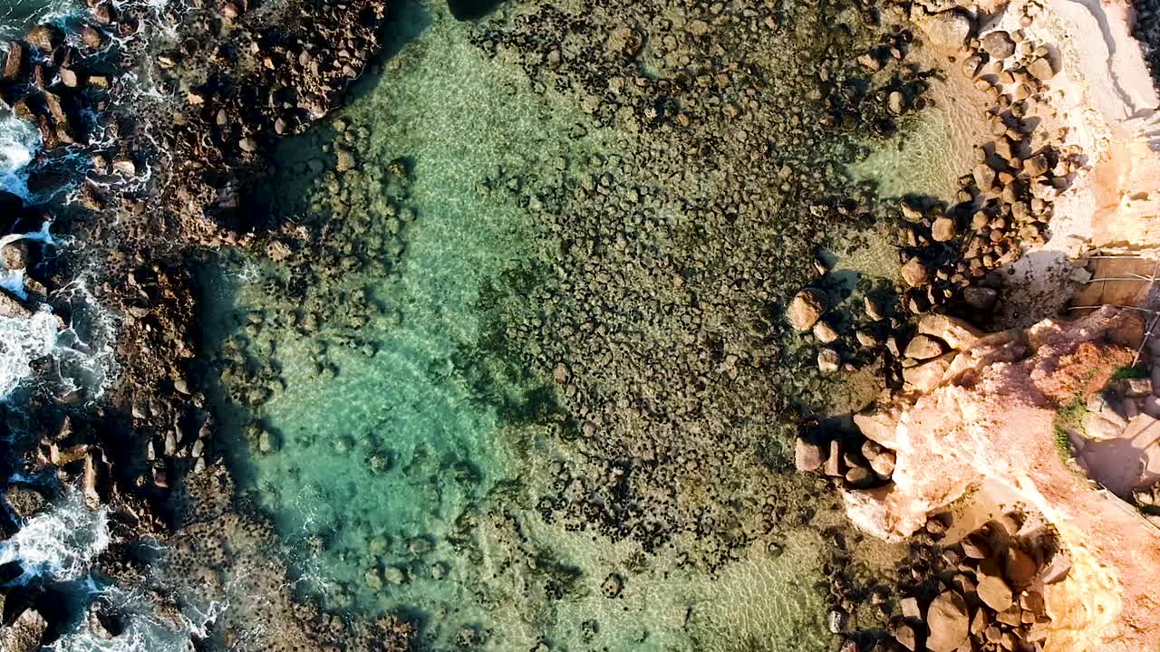 Aerial drone of Mirissa Beach at sunset golden hour